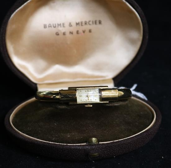 A ladys 14ct gold Baume & Mercier manual wind open bangle wrist watch,